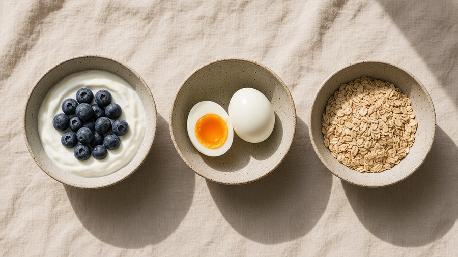 Three bowls in a row: yoghurt, eggs and oats